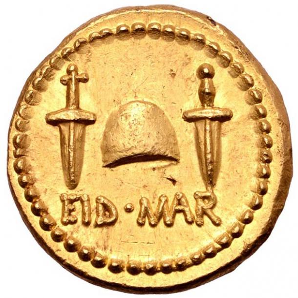 Two daggers and the words “EID MAR” depicted on the rare assassination coin of Julius Caesar. (Numismatic Guaranty Corporation)