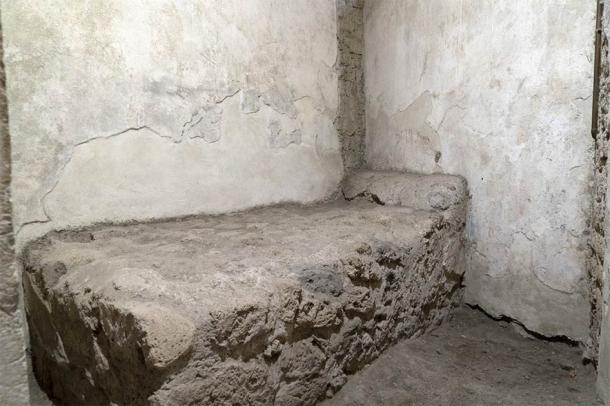 For those on the lower end of the prostitution spectrum, life was not known for comfort, as we can see in this ruin of a brothel in Pompeii with stone beds, each in its own small room akin to a prison cell. (Andrea Izzotti / Adobe Stock)