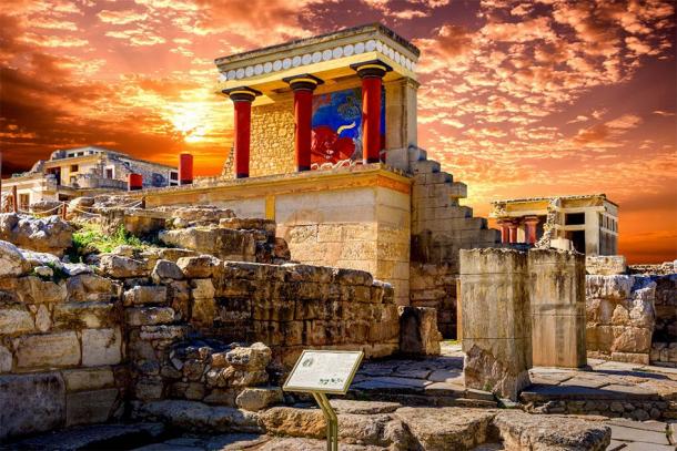 The north entrance of the Knossos Palace and the charging bull fresco in Crete, Greece.