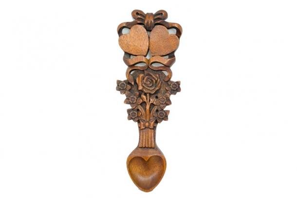 An intricately decorated Welsh Lovespoon. (Neil /Adobe Stock)