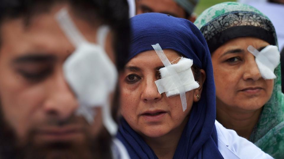 Kashmiri doctors and paramedics, their eyes covered by patches, protest at a hospital in India-held Kashmirs Srinagara area in hopes of evoking the plight of victims of pellet guns fired by Indian security forces to disperse crowds. 