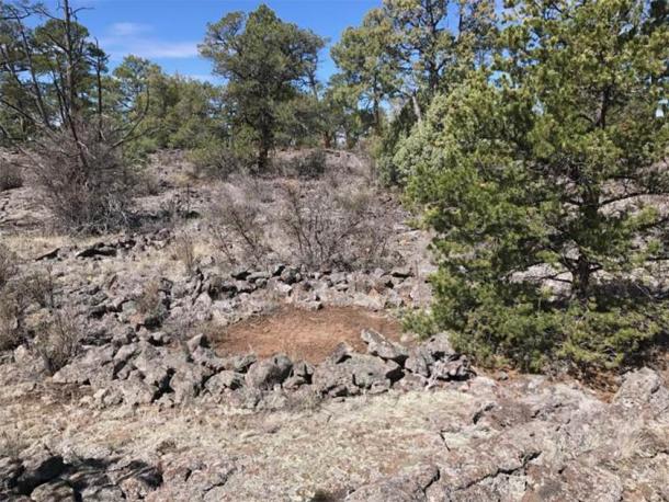 Archeological site next to the cave where it is believed the Ancestral Puebloans left circle-shaped stones while out hunting, which they may have used for ceremonial purposes. (University of South Florida)