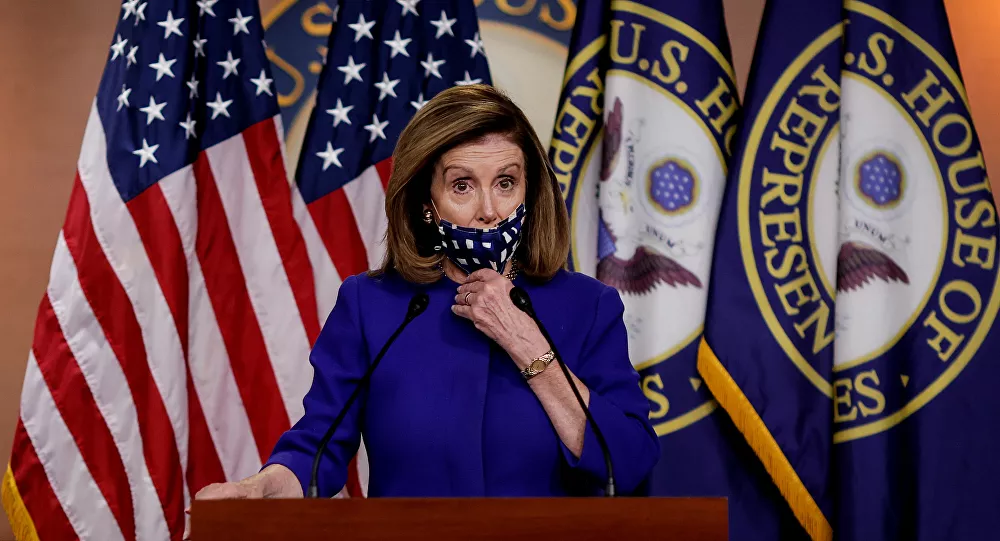 US House Speaker Nancy Pelosi adjusts her face mask as she announces her plans for Congress to create a Commission on Presidential Capacity to Discharge the Powers and Duties of Office Act after US President Donald Trump came down with coronavirus disease (COVID-19), during a Capitol Hill news conference in Washington, US, 9 October 2020.
