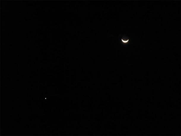 Uranus by a crescent moon. (Leonora (Ellie) Enking /CC BY SA 2.0)
