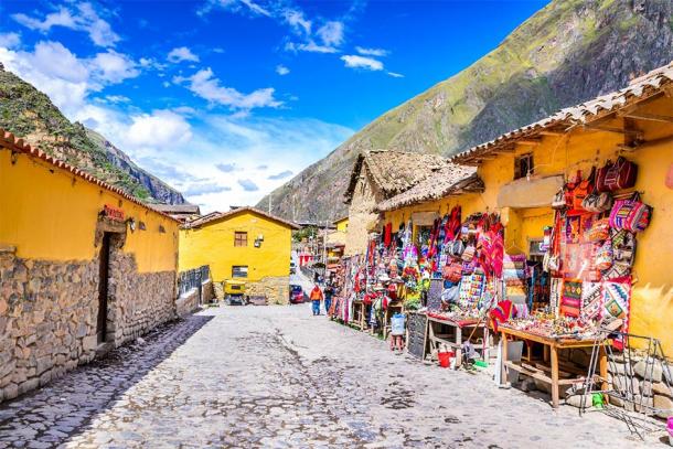The colorful streets of Ollantaytambo, Peru which pass through the ancient Inca town and lead to the heights of Machu Picchu. (cge2010 / Adobe Stock)