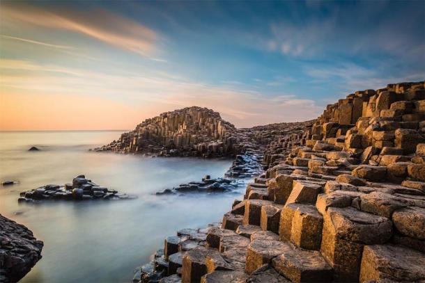 The Giant’s Causeway in the evening light. Credit: Ossie / Adobe Stock