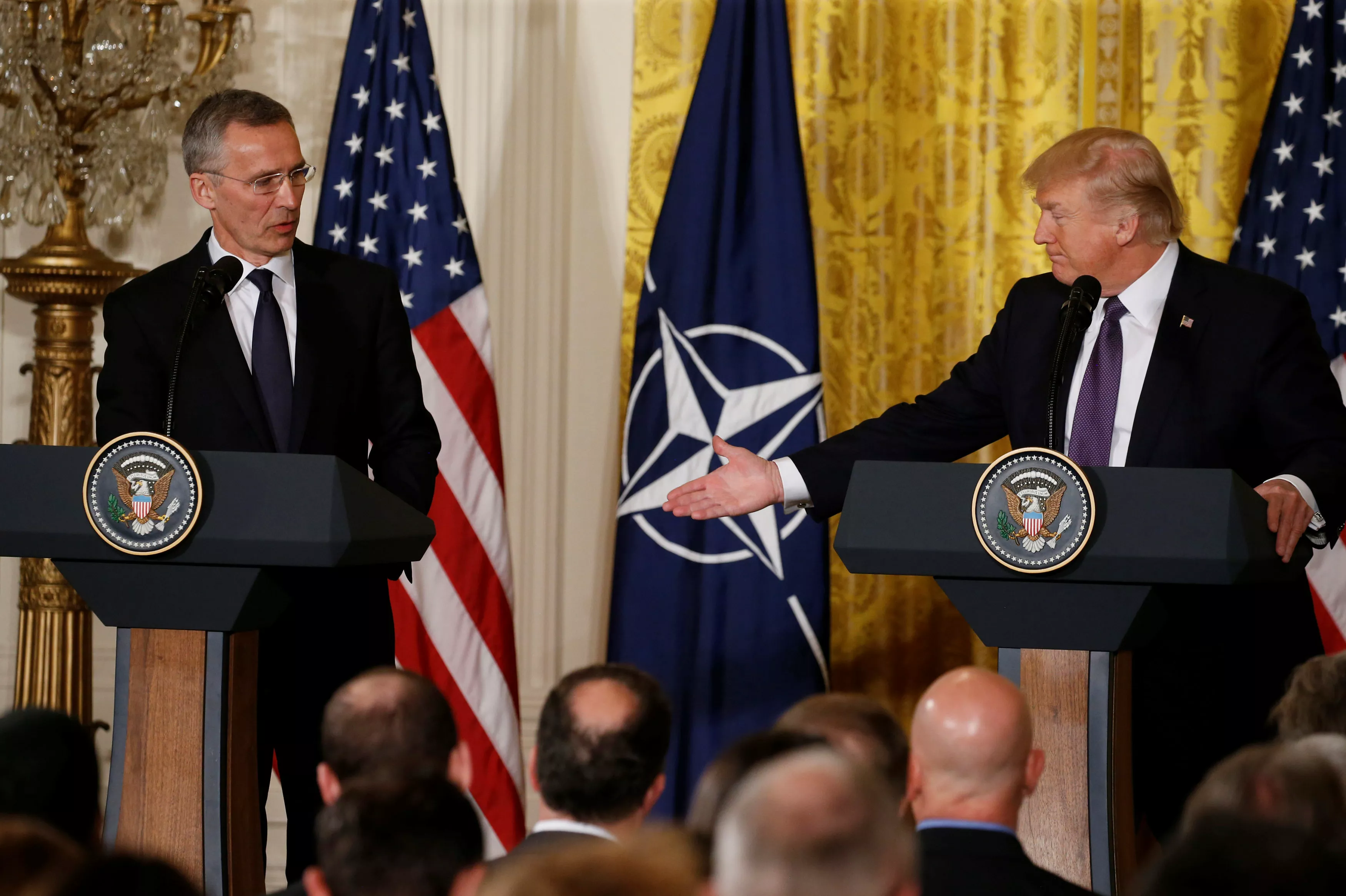 U.S. President Donald Trump (R) and NATO Secretary General Jens Stoltenberg hold a joint news conference in the East Room at the White House in Washington, U.S., April 12, 2017.
