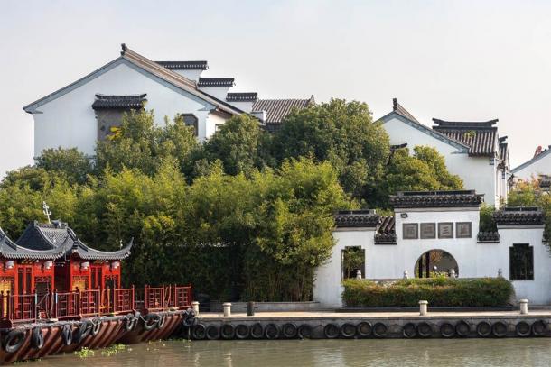 Painted barge docked at the Zhouzhuang Wansan Pier which relates to the town’s long and prosperous trade history. (Weiming / Adobe Stock)