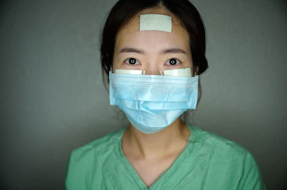 Nurse Yun Na-yong poses during a break between shifts at Keimyung University hospital in Daegu, South Korea, on&nbsp;March 12