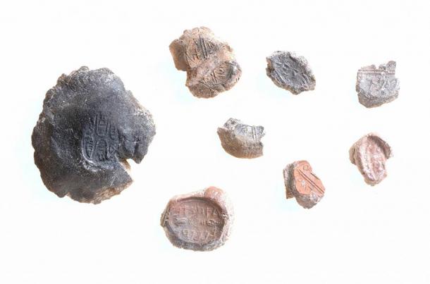 A collection of “typical” bulla or seals found in Israel. (Clara Amit / Israel Antiquities Authority)