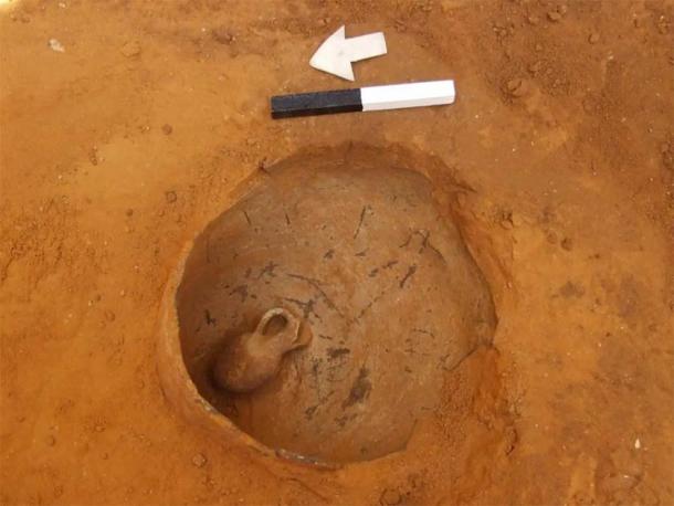 A jar in which a baby had been buried, lying inside a jug, in a Middle Bronze Age II funerary context. (Yuval Arbel, Israel Antiquities)