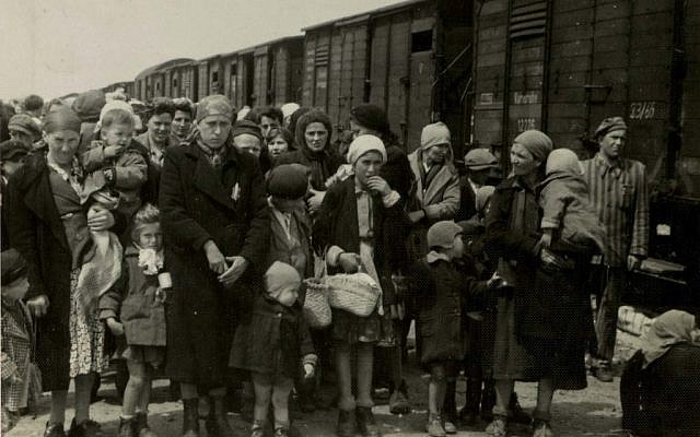 Jewish women and children deported from Hungary, separated from the men, line up for selection on the selection platform at Auschwitz camp in Birkenau, Poland, in 1944. (Photo credit: AP/Yad Vashem Photo Archives)