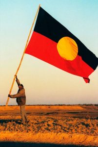 Aboriginal elder kevin buzzacot aboriginal flag