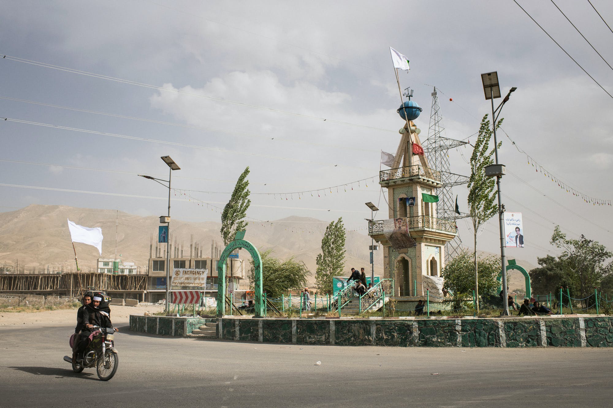 On the third and final day of the first-ever ceasefire between Afghan government and Taliban forces in June 2018, the main traffic roundabout in Wardak’s capital Maidan Shahr was topped with a white Taliban flag. The ceasefire saw Afghan security forces and Taliban insurgents crossing into territory under the other group’s control and embracing in the streets. Afterward, the war resumed as if it had never stopped. 