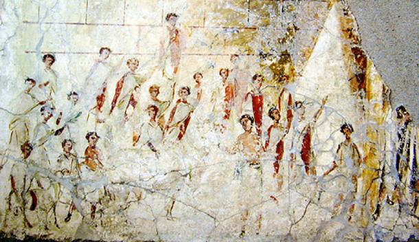 A fresco from a building near Pompeii, a rare depiction of Roman men in togae praetextae with dark red borders. It dates from the early Imperial Era and probably shows an event during Compitalia, a popular street-festival. Source: Brian0918 / Public Domain.