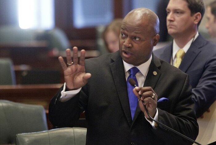 Illinois State Rep. Emanuel &quot;Chris&quot; Welch speaks to lawmakers at the Capitol in Springfield during pre-Covid days.