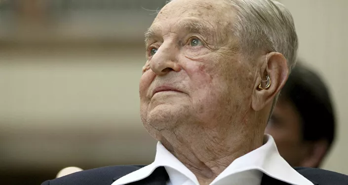 FILE - In this June 21, 2019, file photo, George Soros, Founder and Chairman of the Open Society Foundations, looks before the Joseph A. Schumpeter award ceremony in Vienna, Austria. Soros, the billionaire investor and philanthropist who has long been a target of conspiracy theories, is now being falsely accused of orchestrating and funding the protests over police killings of black people that have roiled the United States