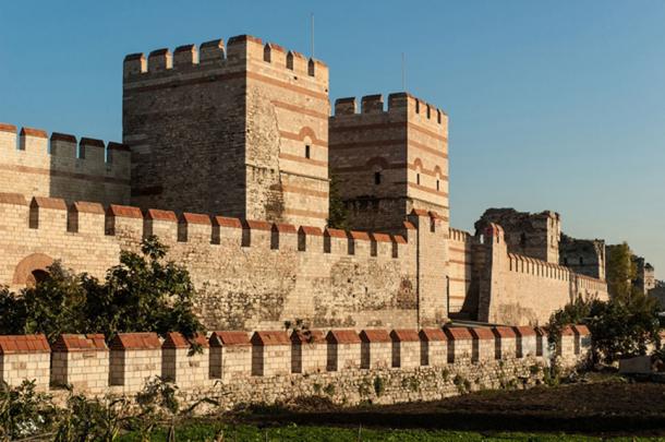 Section of existing (restored) three wall structure that once protected Constantinople. (dinosmichail /Adobe)