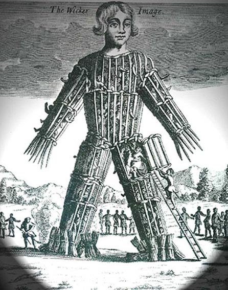 Another 18th century engraving of a wicker man filled with people.