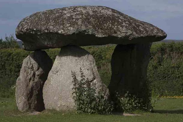 Spinster's Rock is a Neolithic dolmen said to have been created when a group of maidens were turned into stone as punishment for dancing on the Sabbath. (Mik Peach / CC BY-SA 4.0)