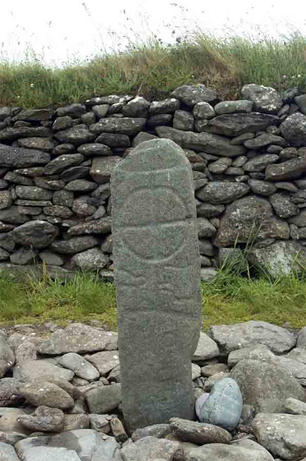 Ogham writing on an old Celtic cross, Gallarus, Ireland. (nyiragongo /Adobe Stock)