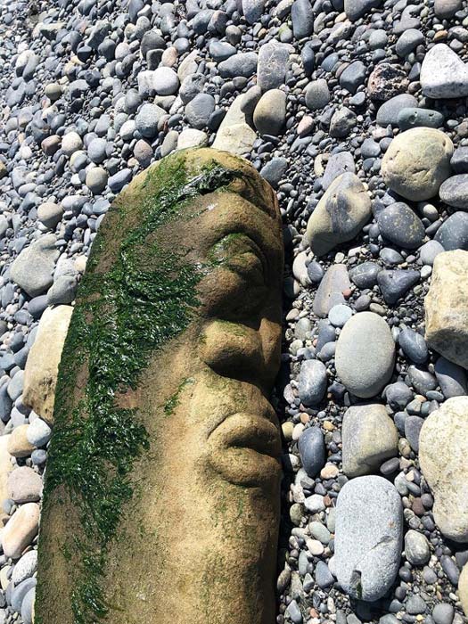 The stone carving was discovered by Bernhard Spalteholz while walking on a beach in British Colombia, Canada. The Canadian artwork has since sparked controversy due to its possible misidentification by an archaeologist at the Royal British Colombia Museum. (Bernhard Spalteholz / Royal B.C. Museum)