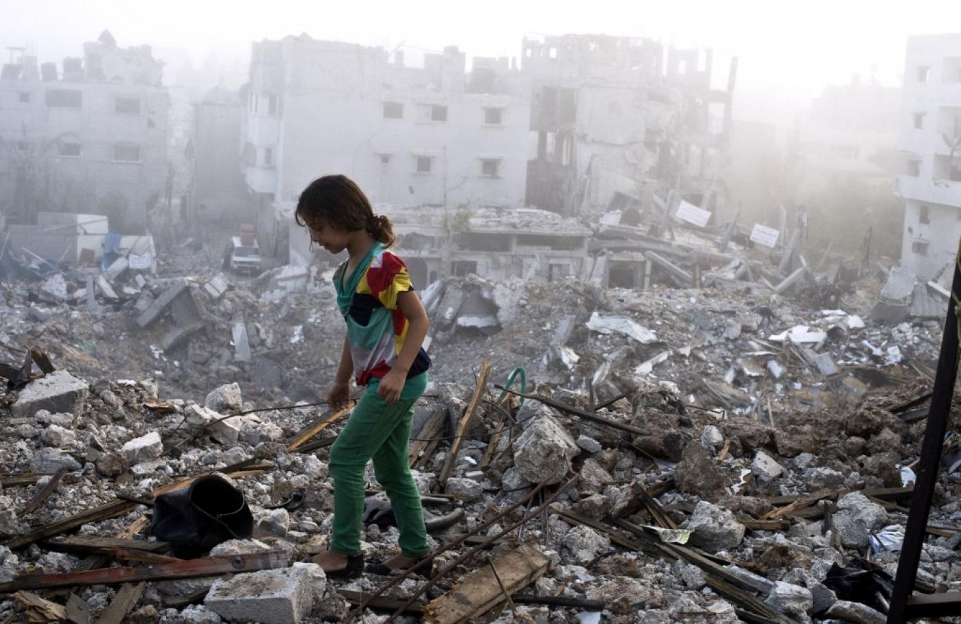 This image has an empty alt attribute; its file name is gaza%20rubble%202014%20afp.jpg
