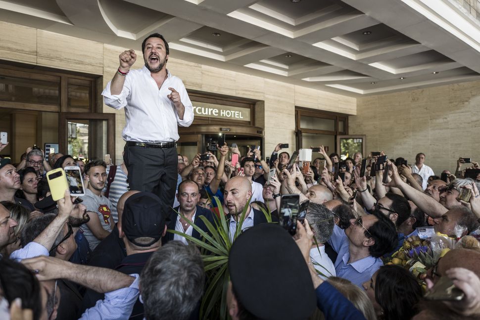 Then-new interior minister Matteo Salvini rallies his supporters at the Sicilian port city of Catania&nbsp;on June 3, 2018, t