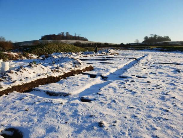 In recent snowfall, the archaeologists are able to clearly see the outline of the Roman villa’s footprint which was discovered along with the Iron Age settlement. (DigVentures)