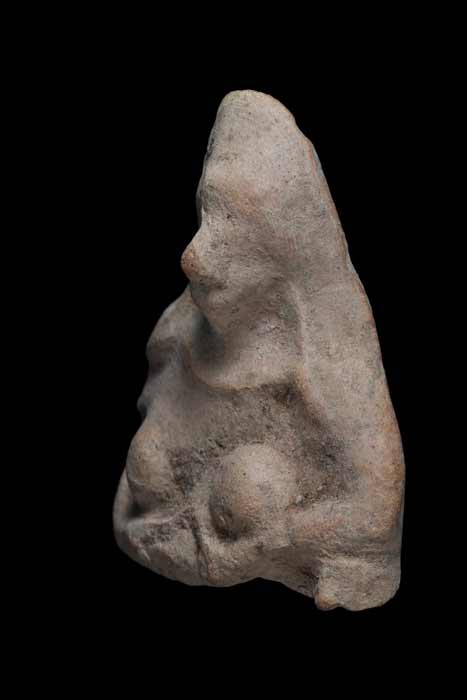 The fertility goddess amulet found by the 11-year-old boy in the Negev region of Israel, which is seven centimeters (2.7 inches) tall and six centimeters (2.3 inches) wide. (IAA)