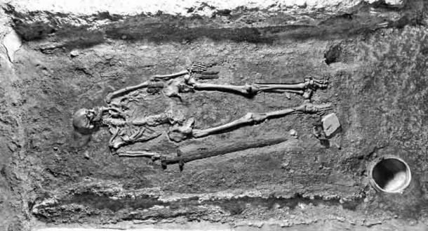 Photo of grave IIIN199, shortly after excavation in 1928, showing the controversial skeleton of what is now known as being a Slavic warrior. (Institute of Archaeology of the CAS / Prague Castle Excavations)