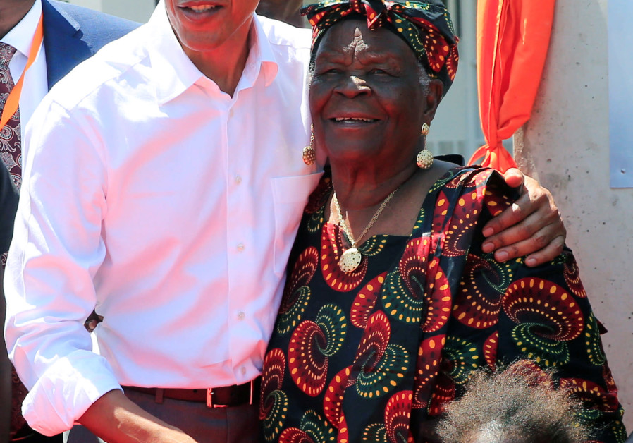  Former US President Barack Obama embrace his grandmother Sarah Obama at the Sauti Kuu resource centre near his ancestral home in Nyangoma Kogelo village in Siaya county, western Kenya July 16, 2018. (Credit: REUTERS/THOMAS MUKOYA)