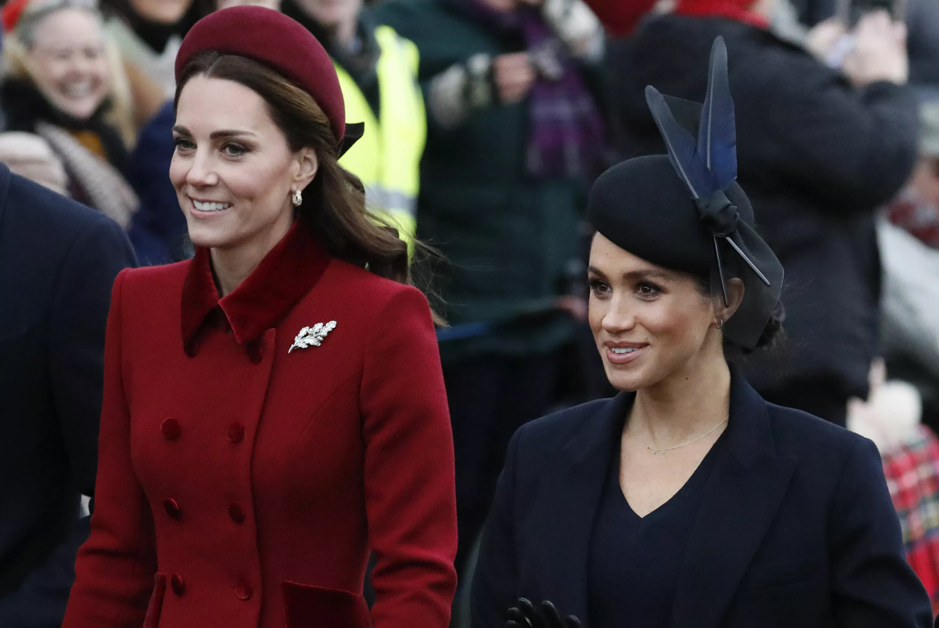 FILE - In this Tuesday, Dec. 25, 2018 file photo, Britain's Kate, Duchess of Cambridge, left, and Meghan, Duchess of Sussex arrive to attend the Christmas day service at St Mary Magdalene Church in Sandringham in Norfolk, England