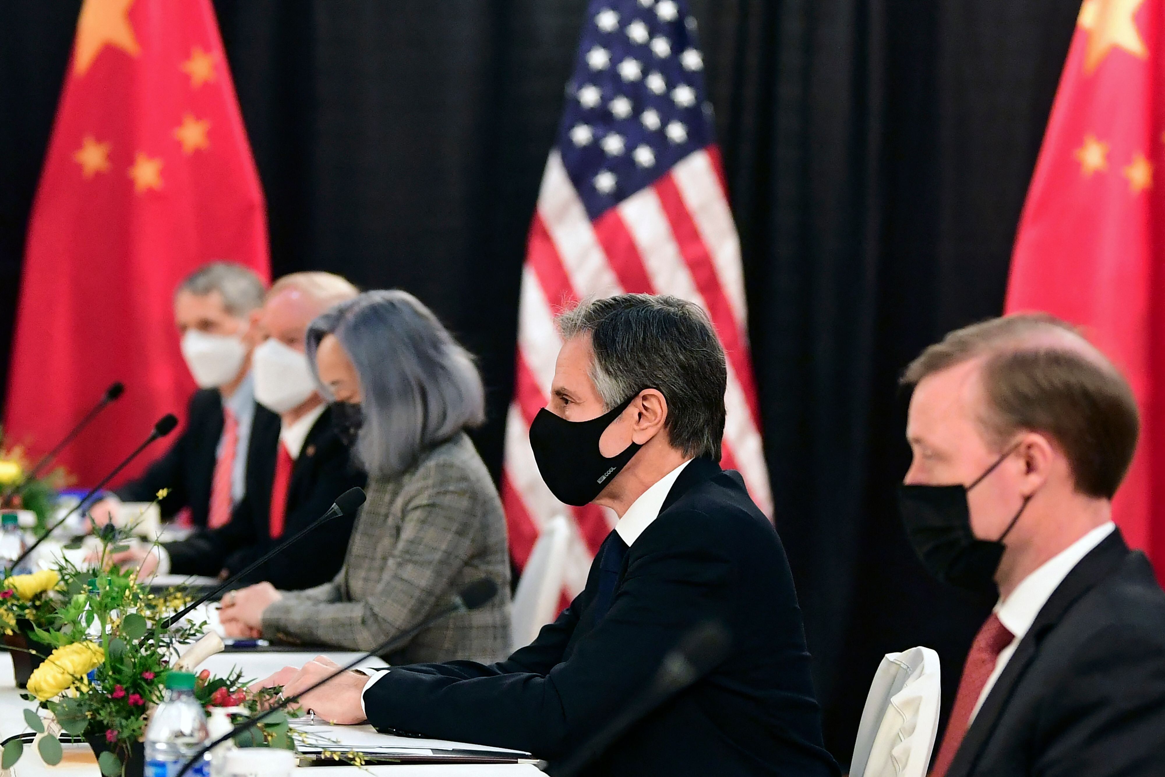 The U.S. delegation led by Secretary of State Antony Blinken (C), flanked by US National Security Advisor Jake Sullivan (R), 