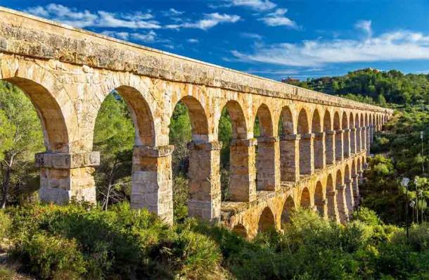 The Les Ferreres Aqueduct, also known as Pont del Diable in Tarragona, Spain was certainly built with limestone from the El Medol Roman quarry. (Leonid Andronov / Adobe Stock)