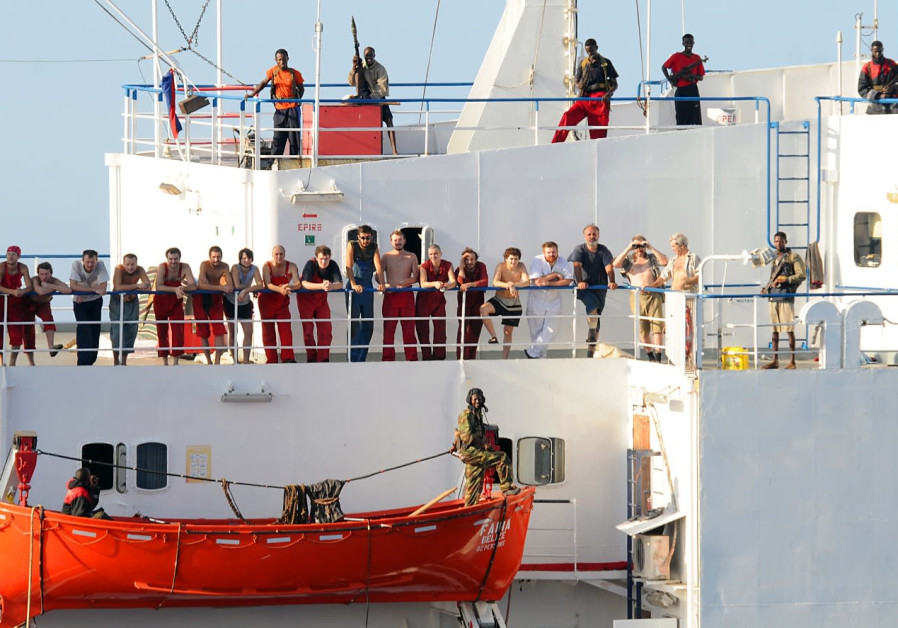  SOMALI PIRATES aboard the ‘MV Faina.’ (Photo credit: Wikimedia Commons)