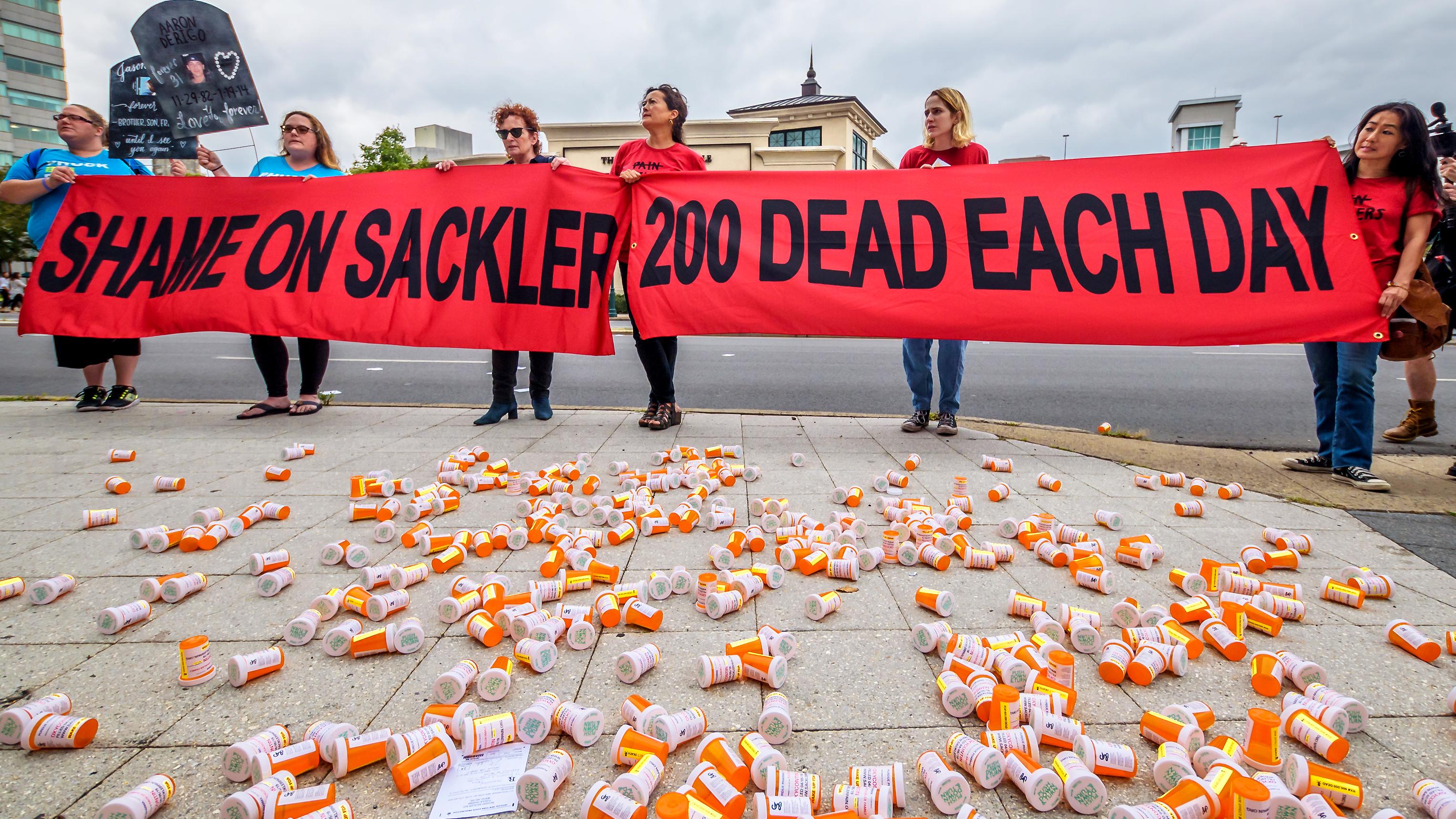 Protesters outside Purdue Pharma headquarters in 2019