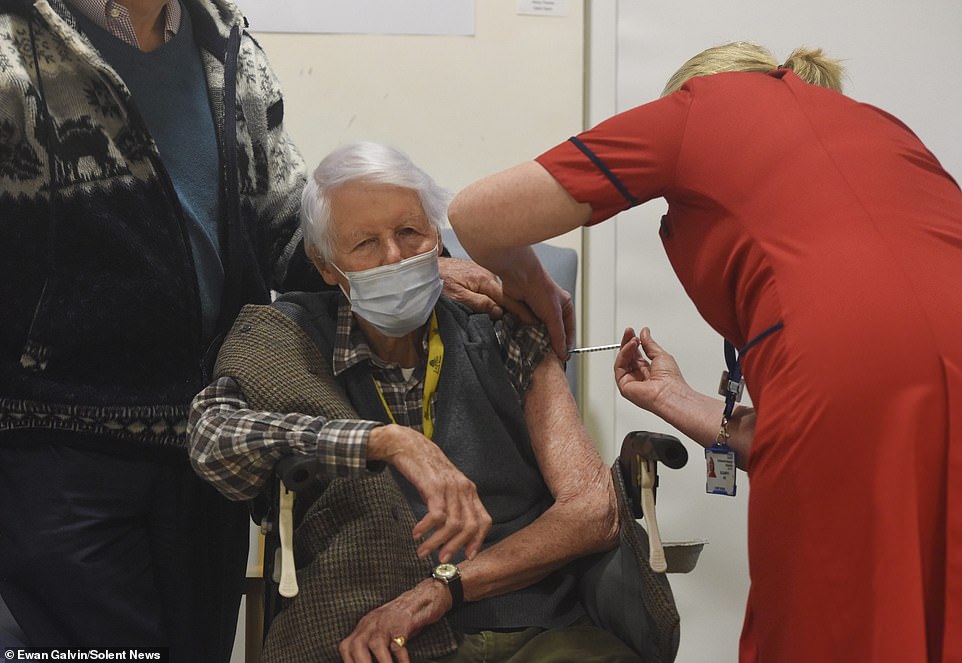 Michael Tibbs, 99, being administered the COVID vaccine by Liz Rix, Chief Nurse.Michael Tibbs was the first person in the South West to receive the Covid-19 vaccination at Queen Alexandra Hospital in Portsmouth
