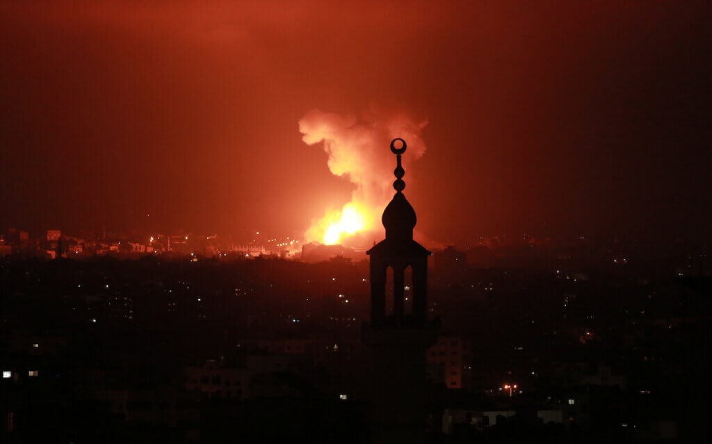 Flames rise following an Israeli air strike amid a flare-up of Israel-Palestinian violence in Gaza City May 10, 2021. (Photo: Bashar Taleb/APA Images)