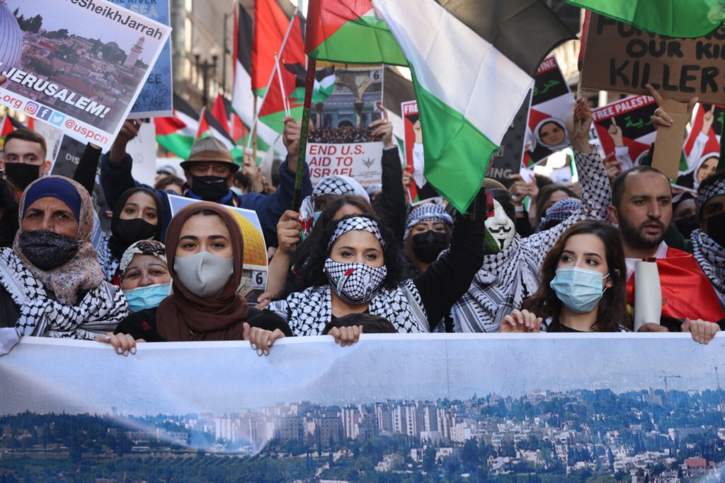 Thousands of people march through downtown to the Israeli consulate to protest Israeli airstrikes in the Gaza Strip on May 12, 2021 in Chicago, Illinois. (Scott Olson/Getty Images)