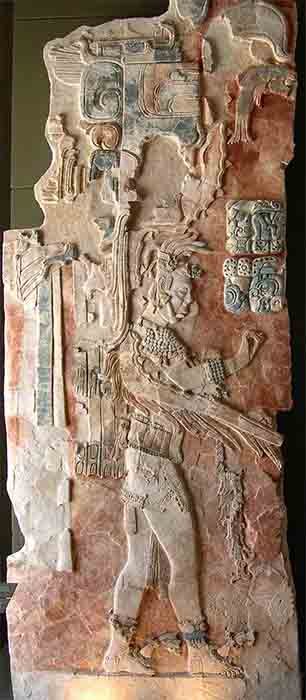 A painted stucco relief in the museum at Palenque, which is similar to the reliefs and mural depictions found at San Bartolo