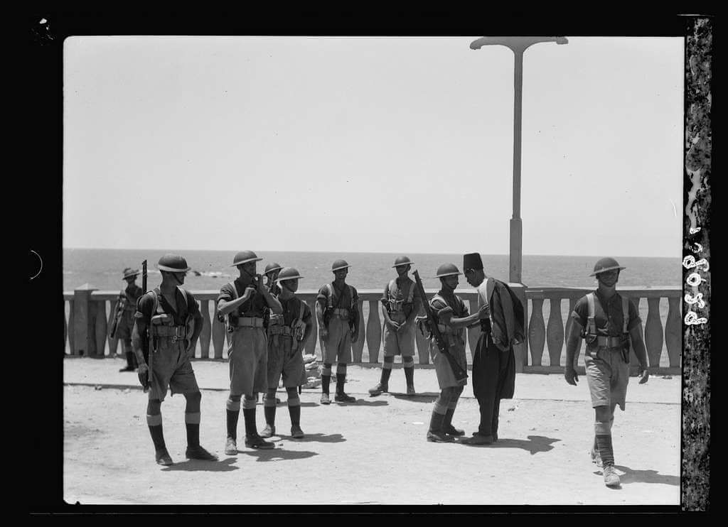Palestinian Arab man being searched by British troops in Jaffa, 1936 (Photo: Matson Registers, v. 1, [1934-1939])