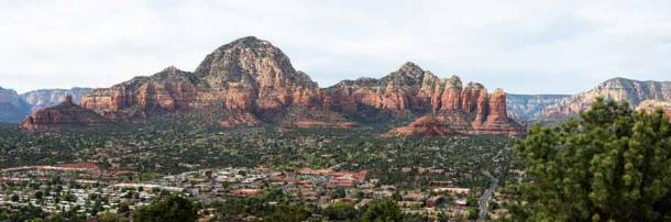 Panoramic overlook of Sedona Arizona with Capitol Butte and Coffeepot Rock in the background. (George Schmiesing / Adobe Stock)
