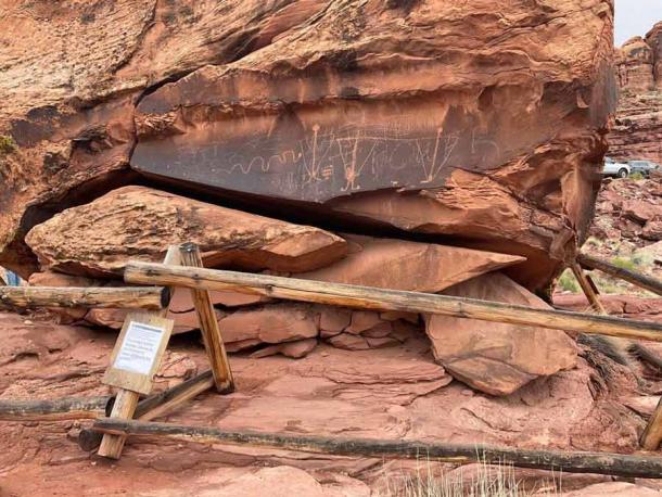 An ancient rock art panel, known as the “Birthing Rock,” has been vandalized in Moab, Utah. (Moab Sun News)