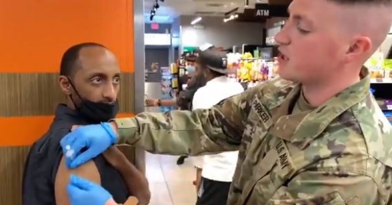 video shows national guard troops administering vaccines in dallas 7 eleven