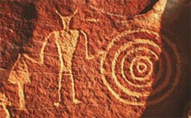 Classic Vernal Style petroglyph by Fremont culture, Utah. With its anthropomorphic trapezoidal torso and broad shoulders with a narrow waist it may be susceptible to the pseudoscientific, Ancient Astronaut Theory. (CC BY-SA 2.5)