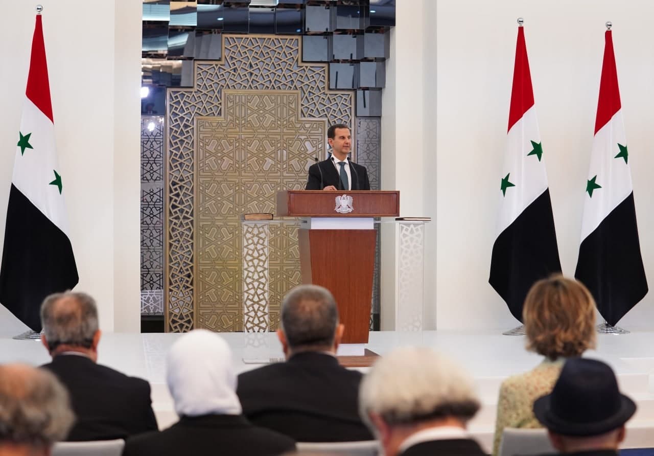 Al-Assad speaking before the People's Assembly