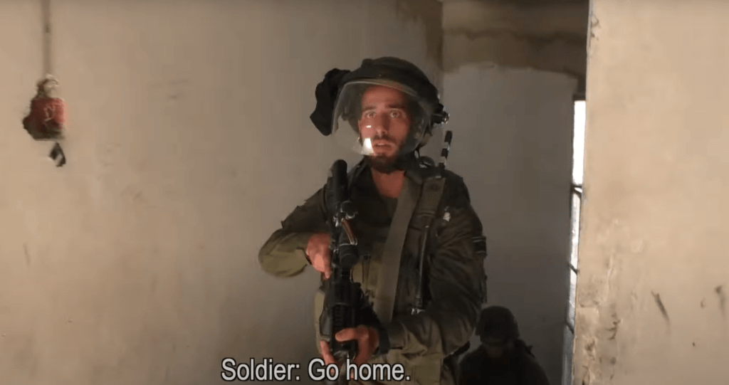 Screenshot of B'Tselem video of Israeli raid on Palestinian home in Hebron, May 13, 2021.