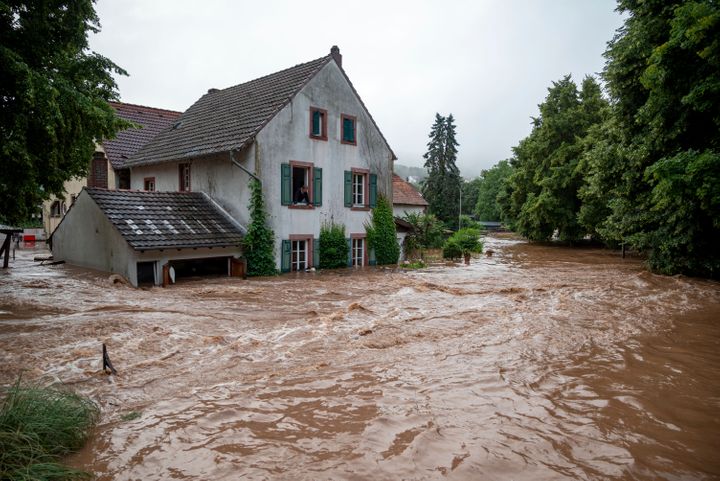 Houses are submerged on the overflowed river banks in Erdorf, Germany.