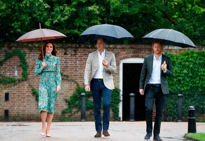 Princes William and Harry, with Kate Middleton, at the memorial gardens in Kensington Palace on Aug. 30, 2017.&nbsp;